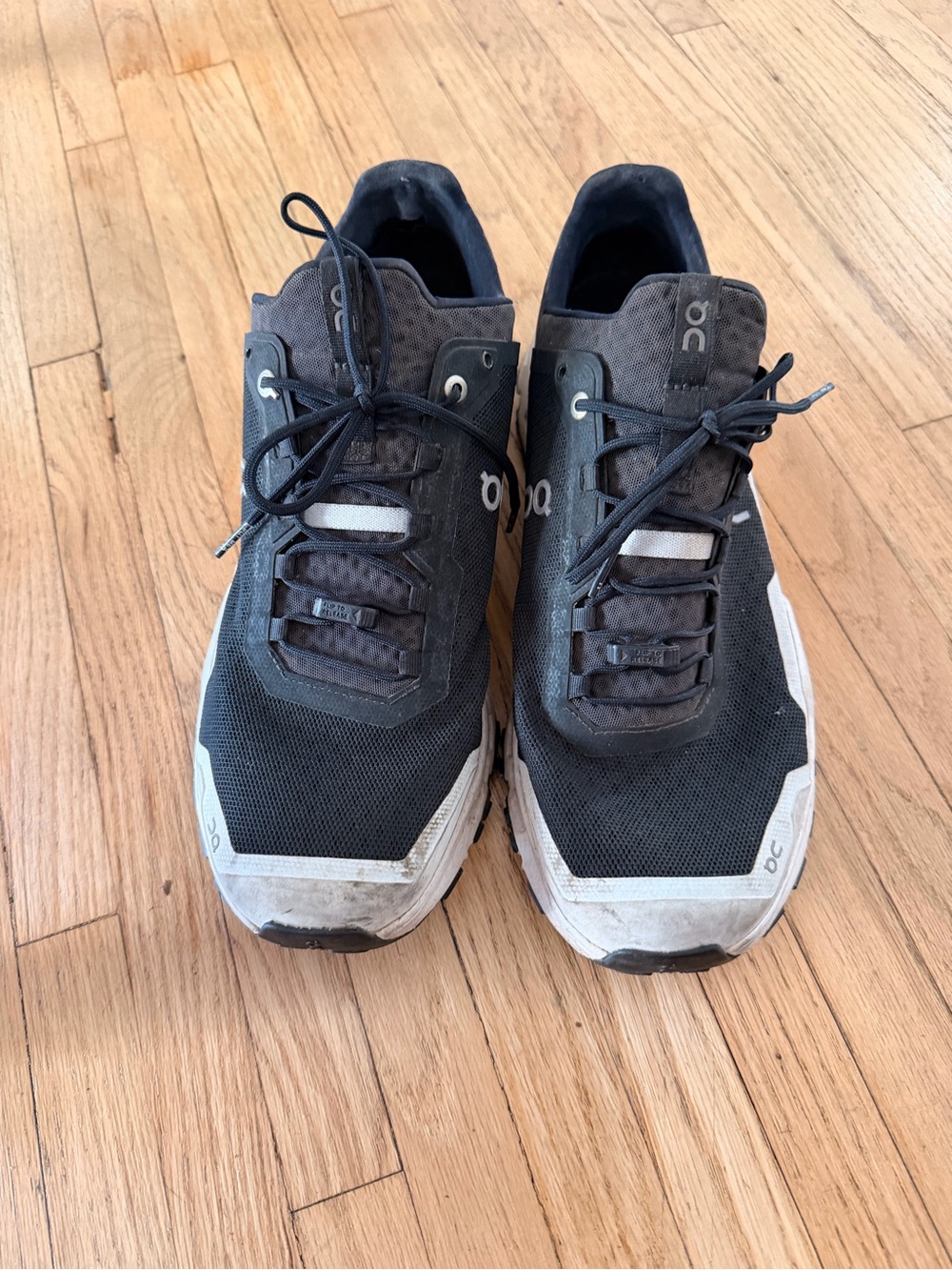 On Running Men's Athletic Sneakers in Black and White